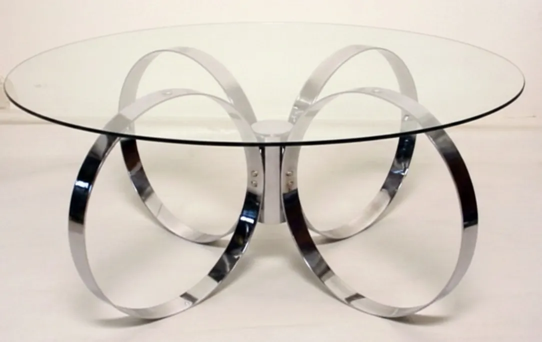 antique coffee table with circular shape and metal base