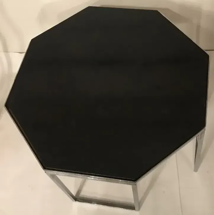 antique octagonal coffee table in an elegant setting