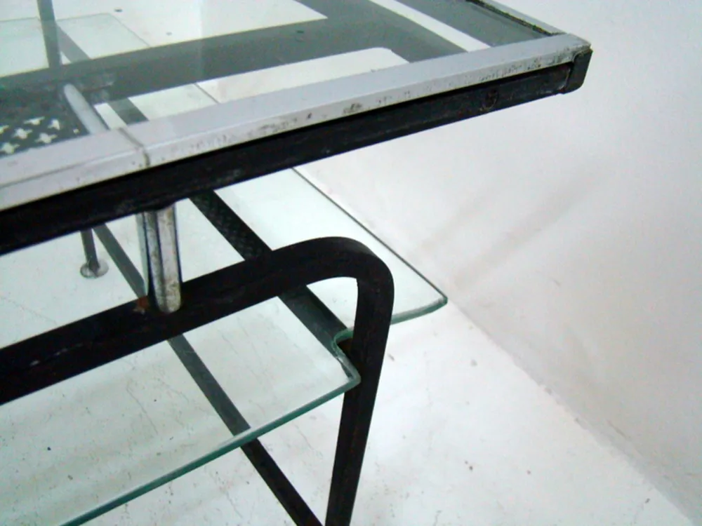 Antique coffee table by Mathieu Matégot with delicate details