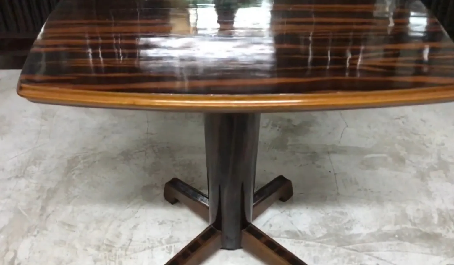 Antique Art Deco table with a shiny finish