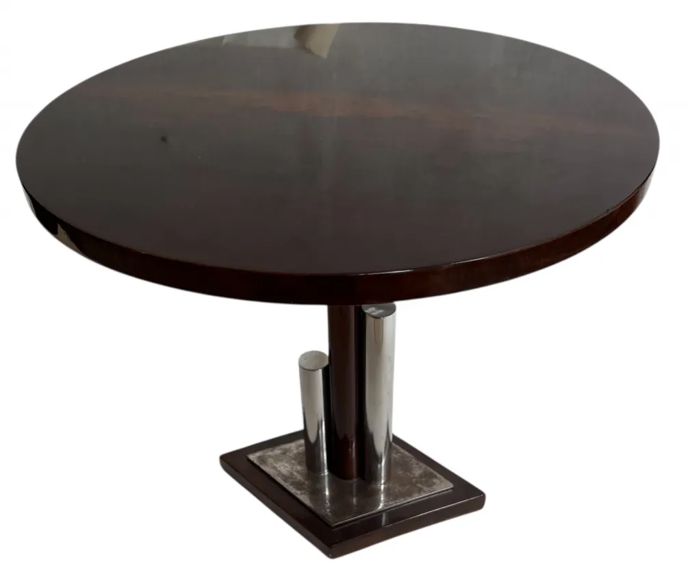 mesa rotonda con base metallica, stile art deco
