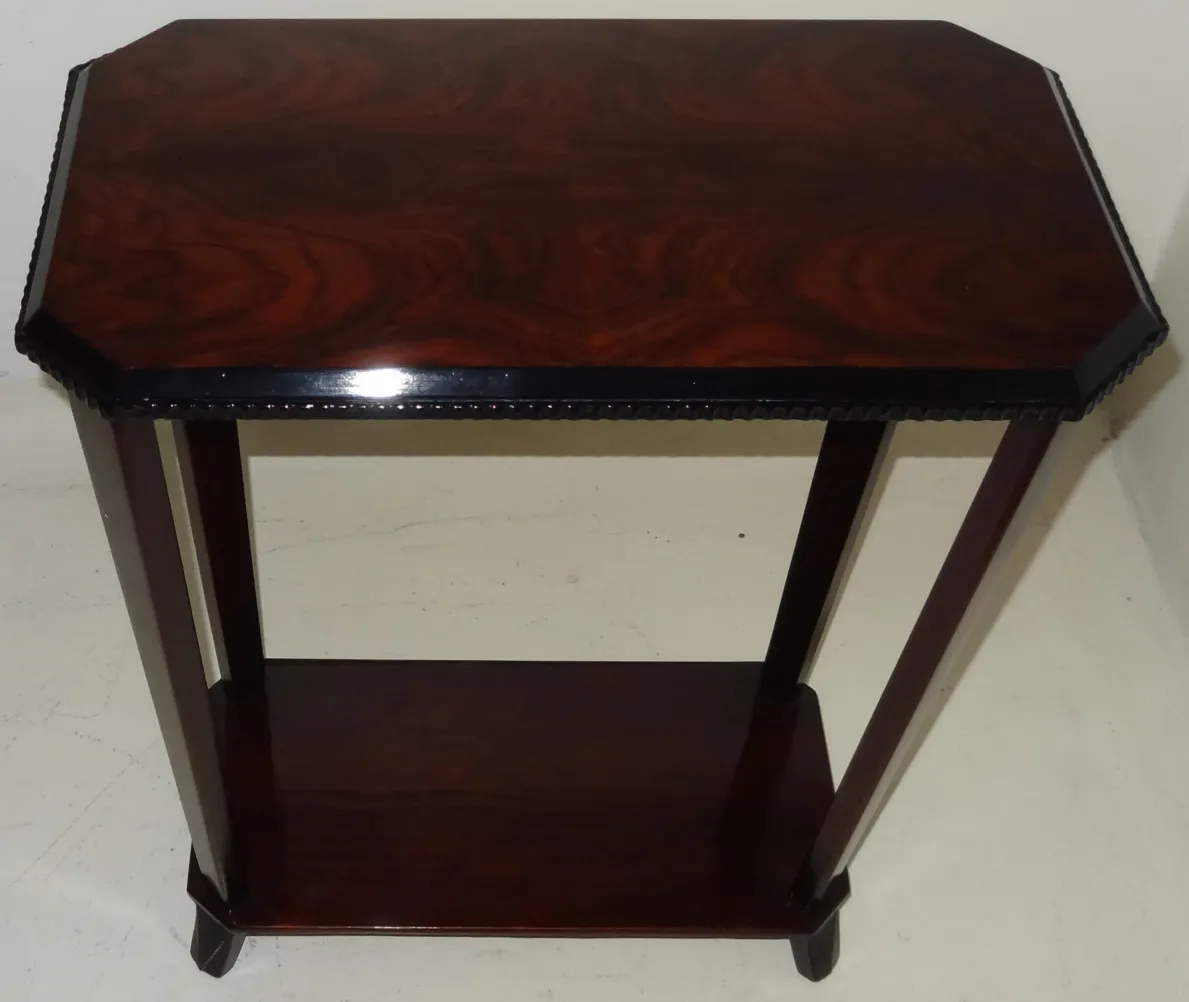 antique small table with octagonal shape and elegant legs in a minimalistic setting