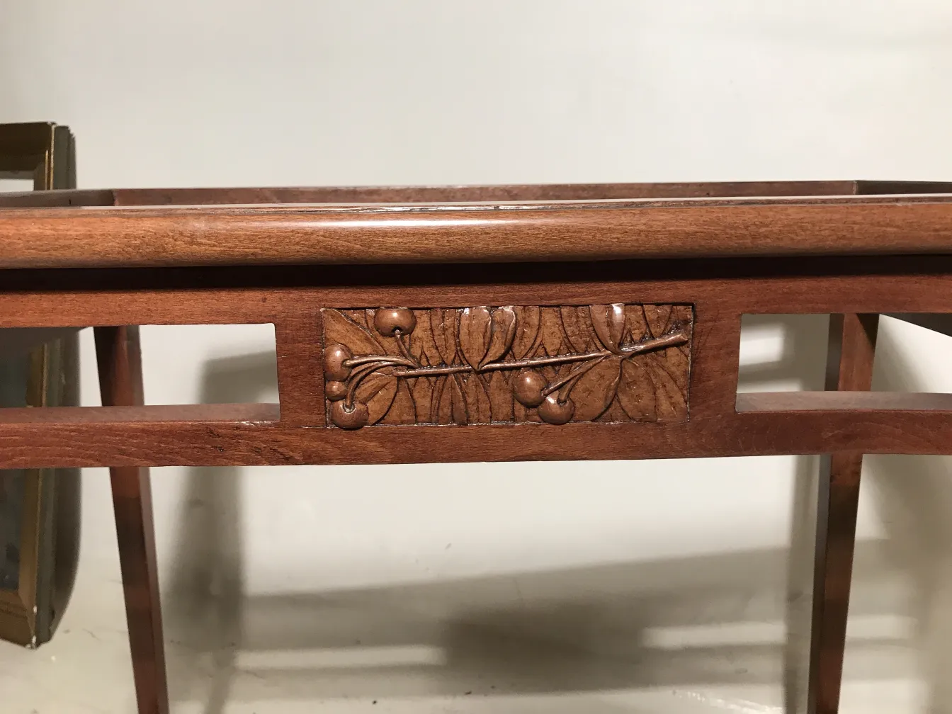 antique table with carvings in Art Nouveau style, elegant setting