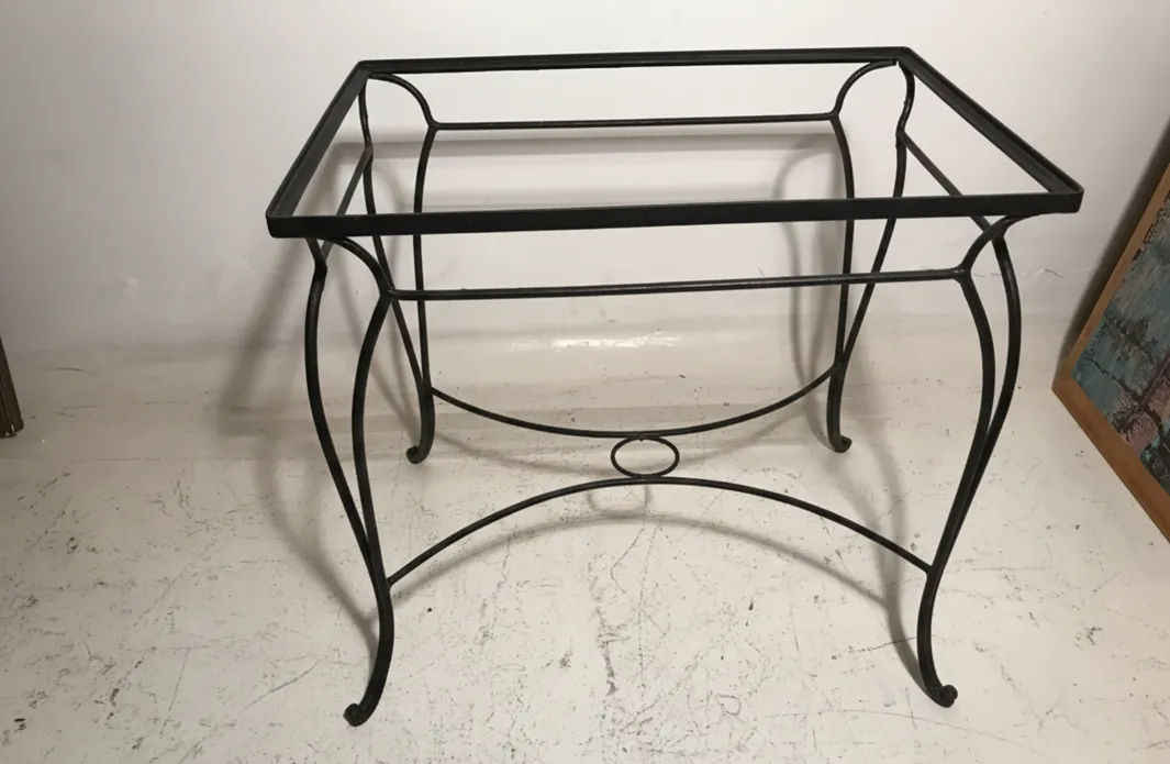 Antique garden table with an elegant design