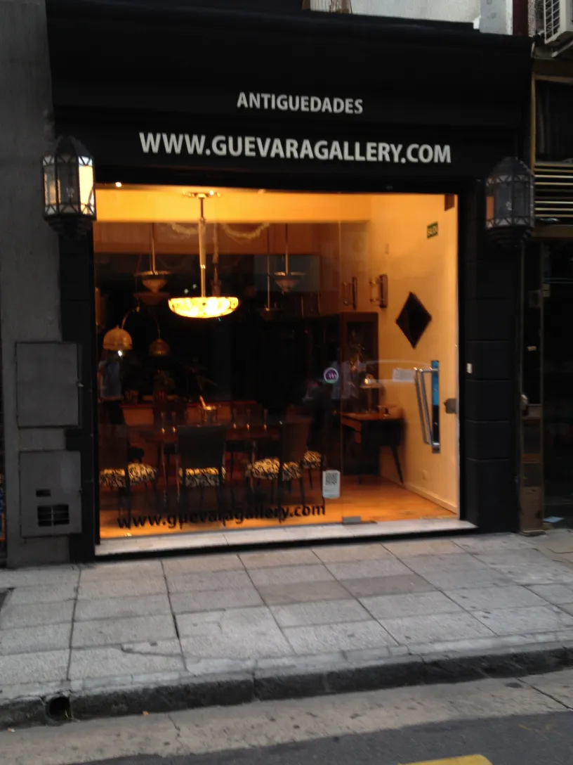 Antique door handles displayed in an antique gallery.