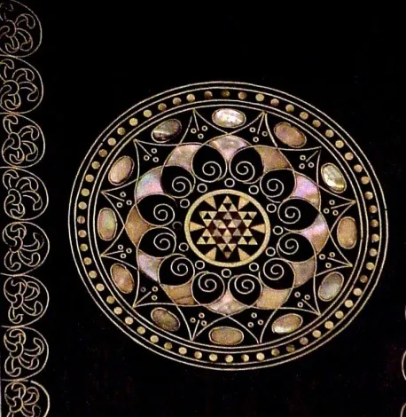 decorative circular detail on an antique desk eugenio quarti