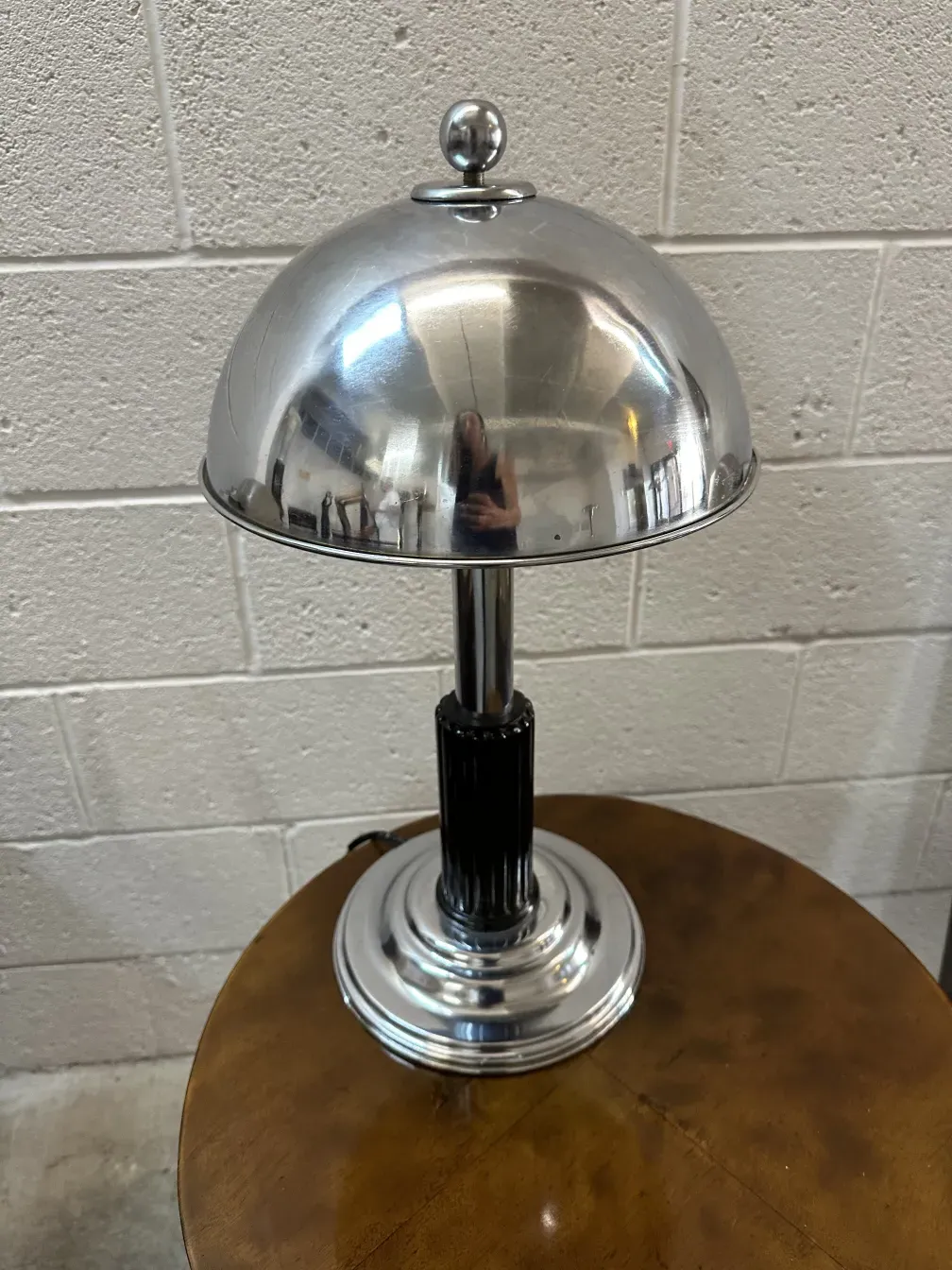 antique table lamp with a shiny art deco base.