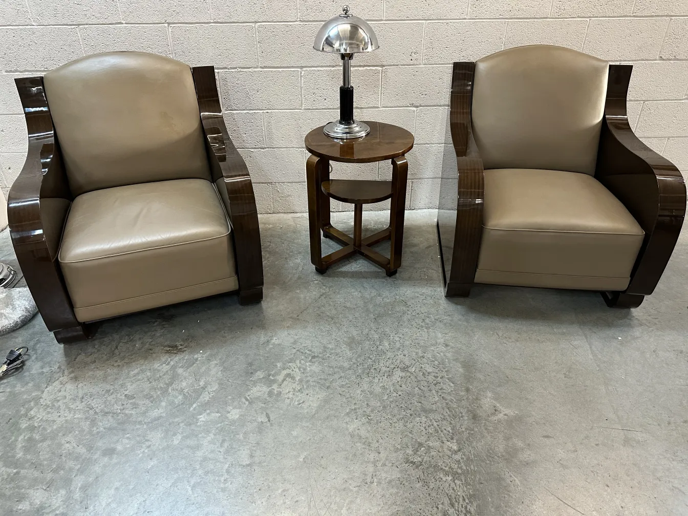 antique art deco table lamp on side table with chairs