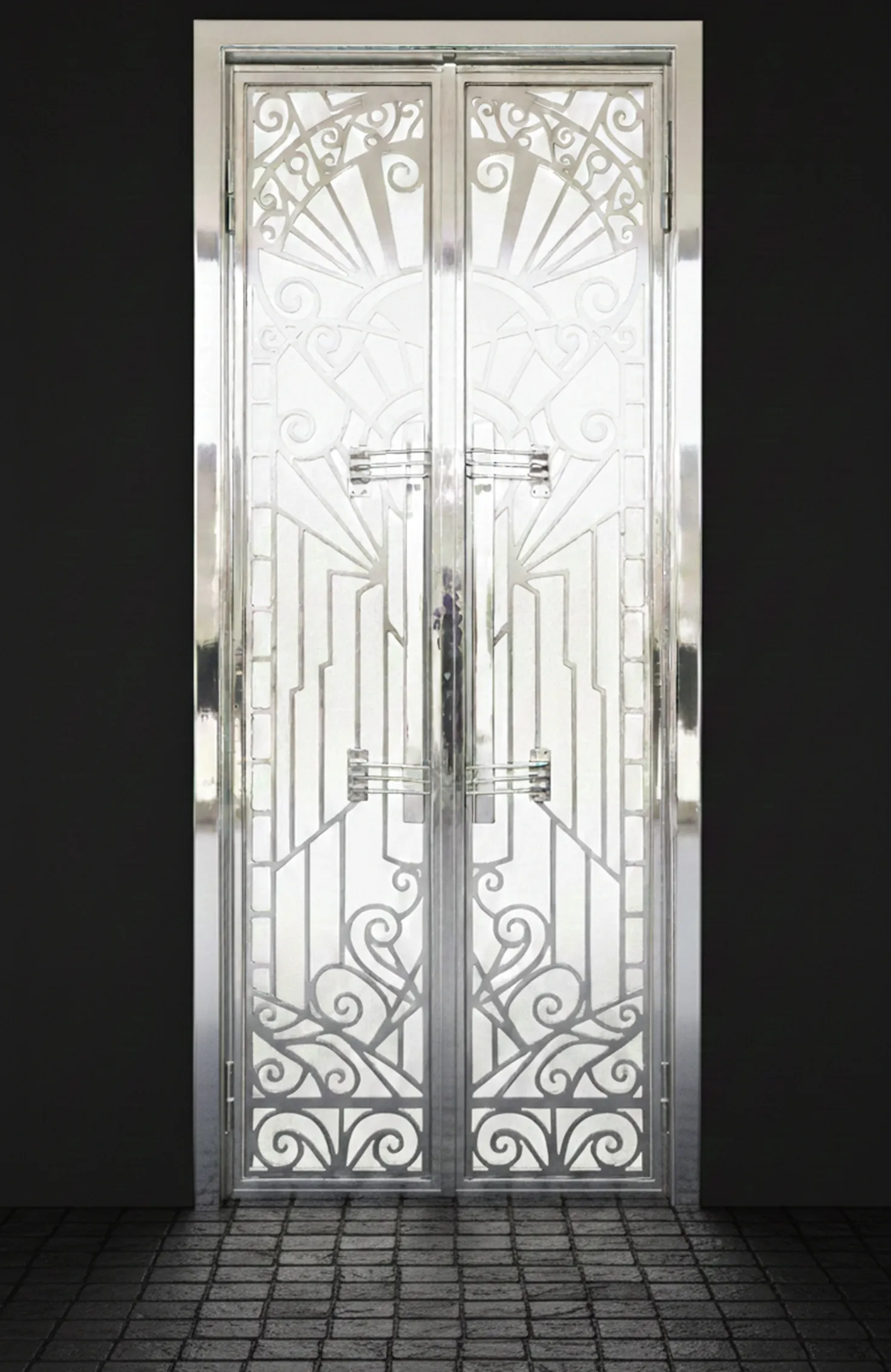 Antique door handles featuring intricate decorative design.