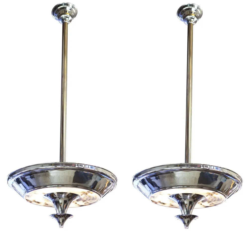 two antique art deco hanging lamps with elegant details