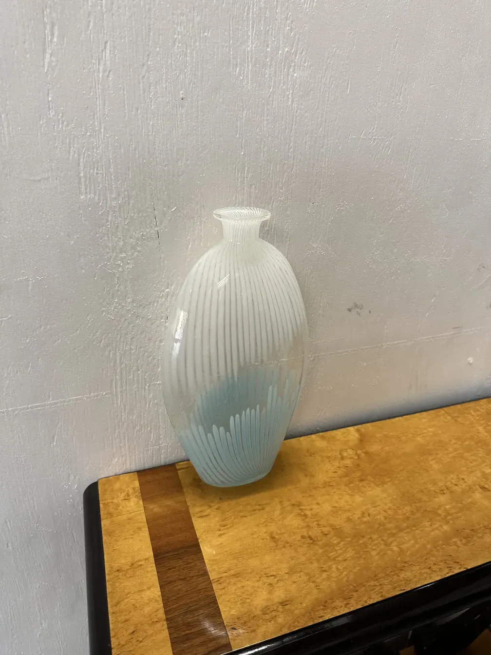 Two antique Murano vases in a simple setting