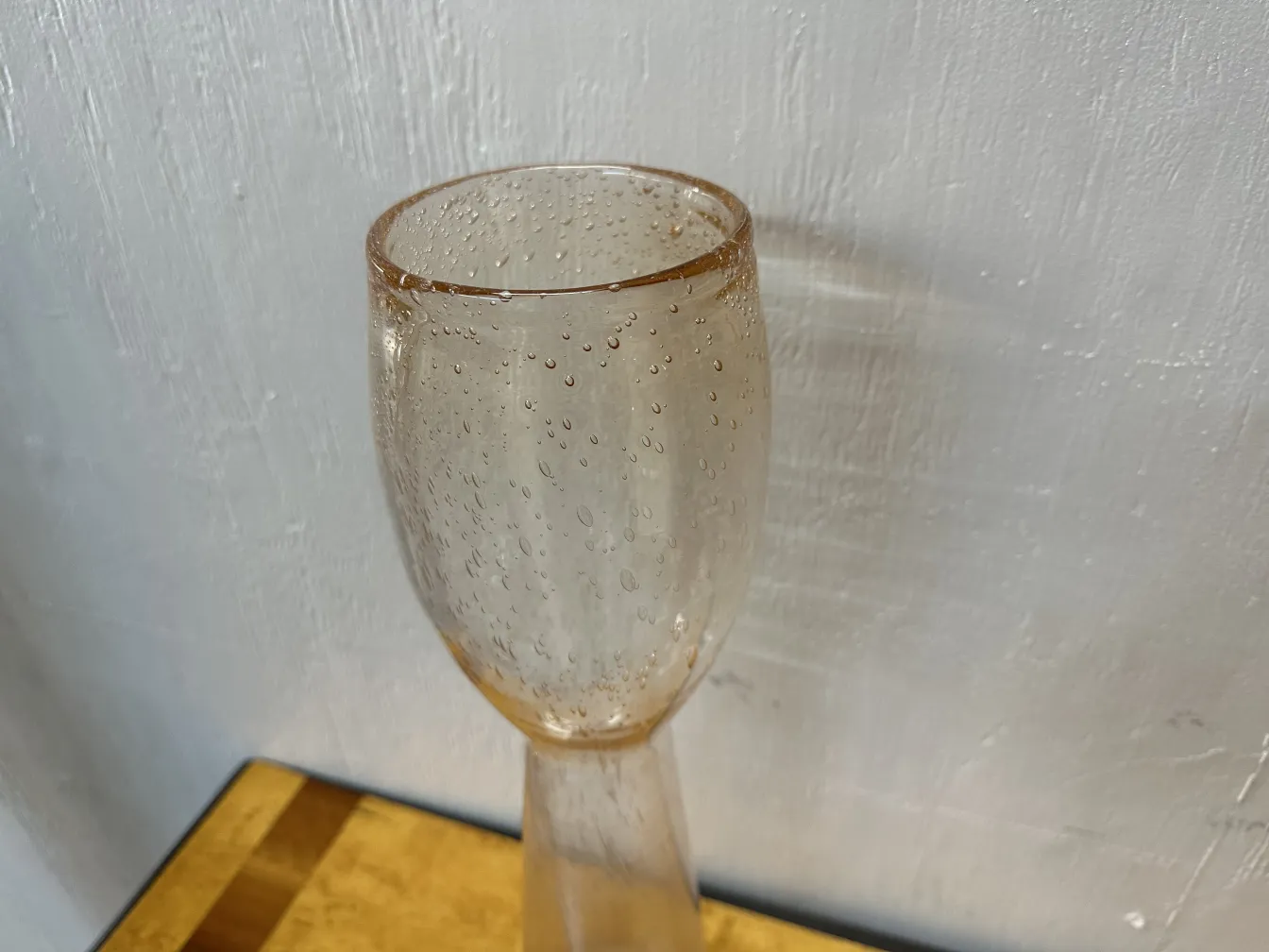 view of 2 antique murano vases with bubbles on a light background