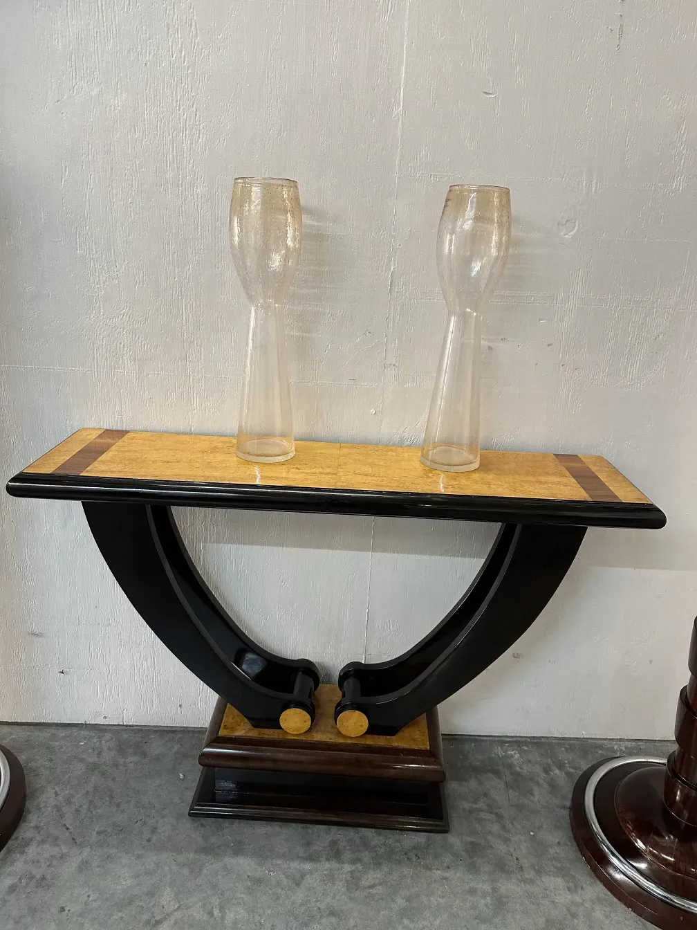 2 antique murano vases, decorative on a table.