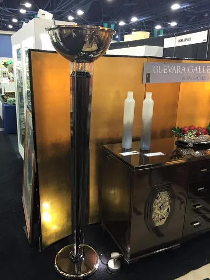 two antique murano vases in a decorative setting