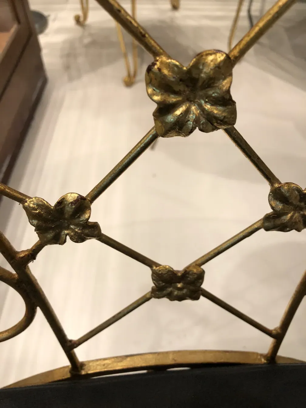 two antique garden armchairs in a cozy setting