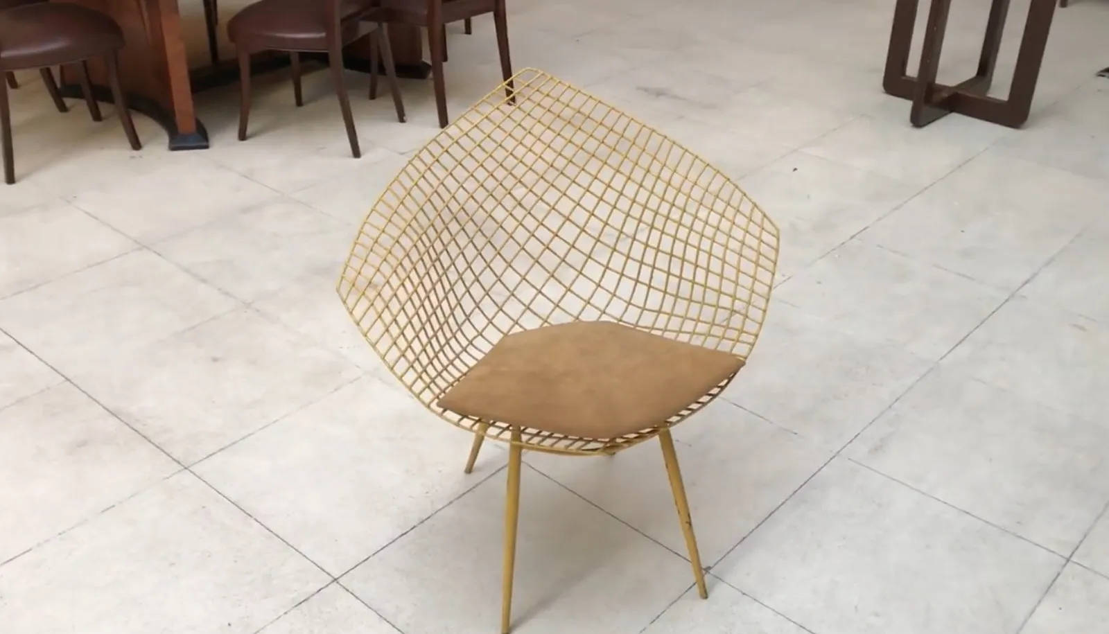 2 garden chairs in a contemporary setting with warm tones