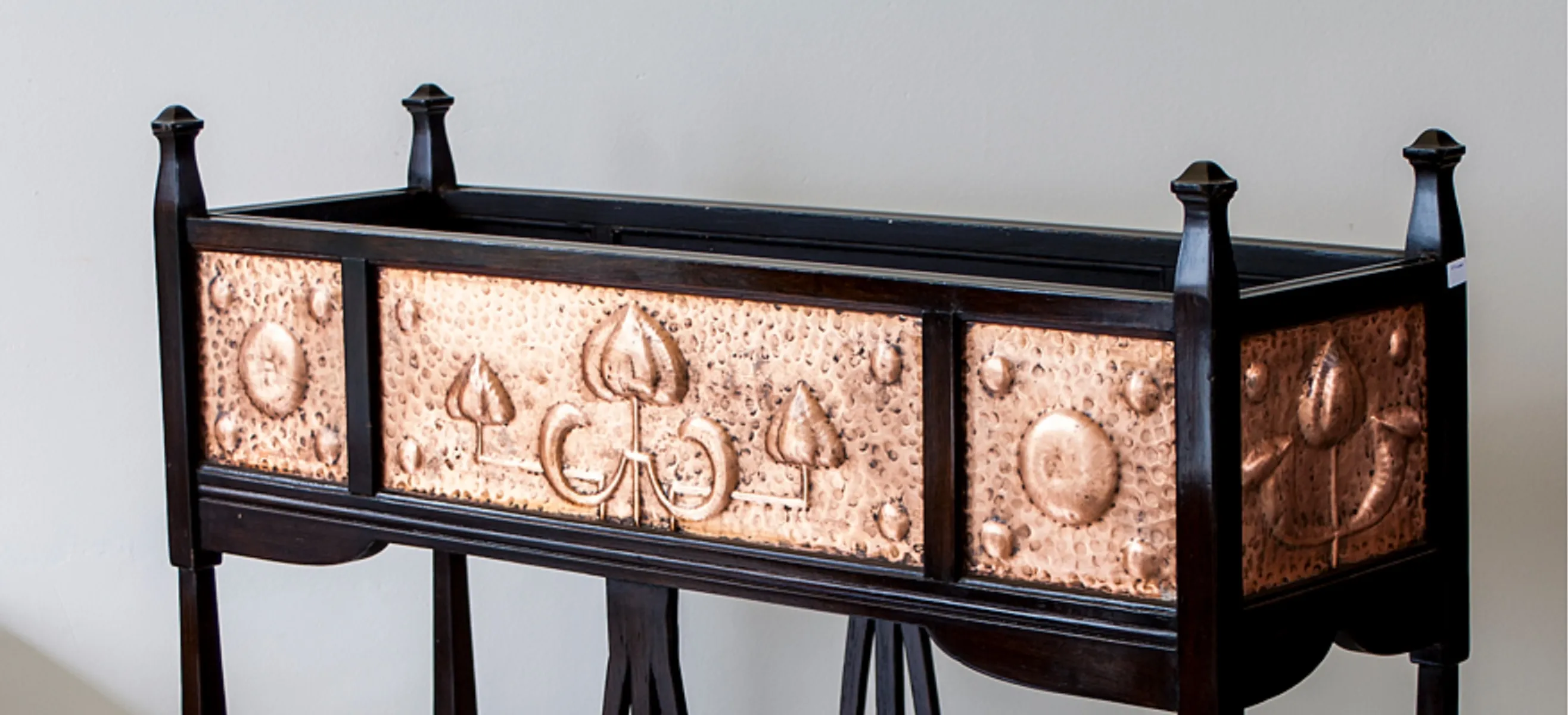 antique console with embossed decorations