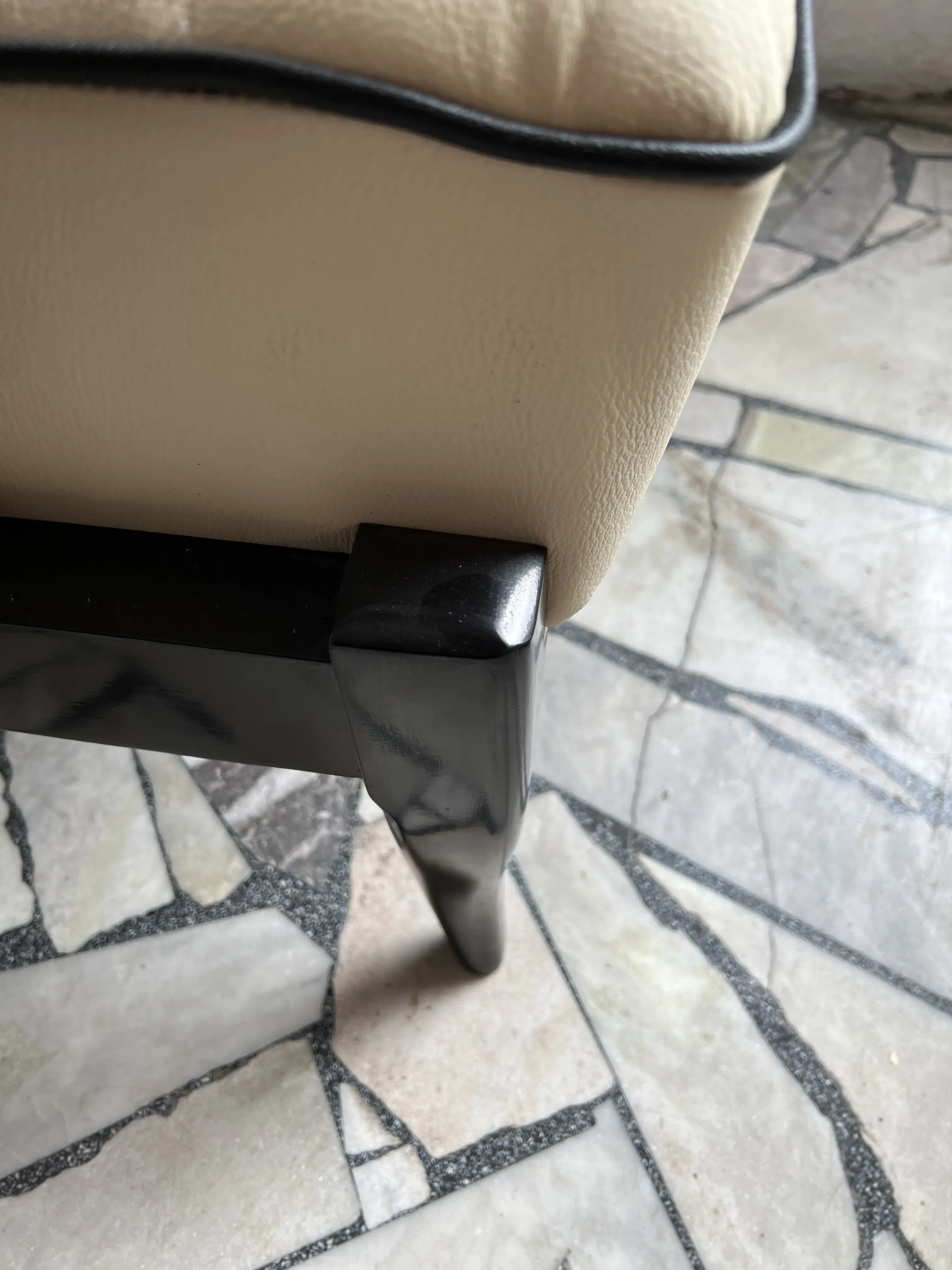 Close view of 2 antique armchairs by Paolo Buffa in a classic setting.