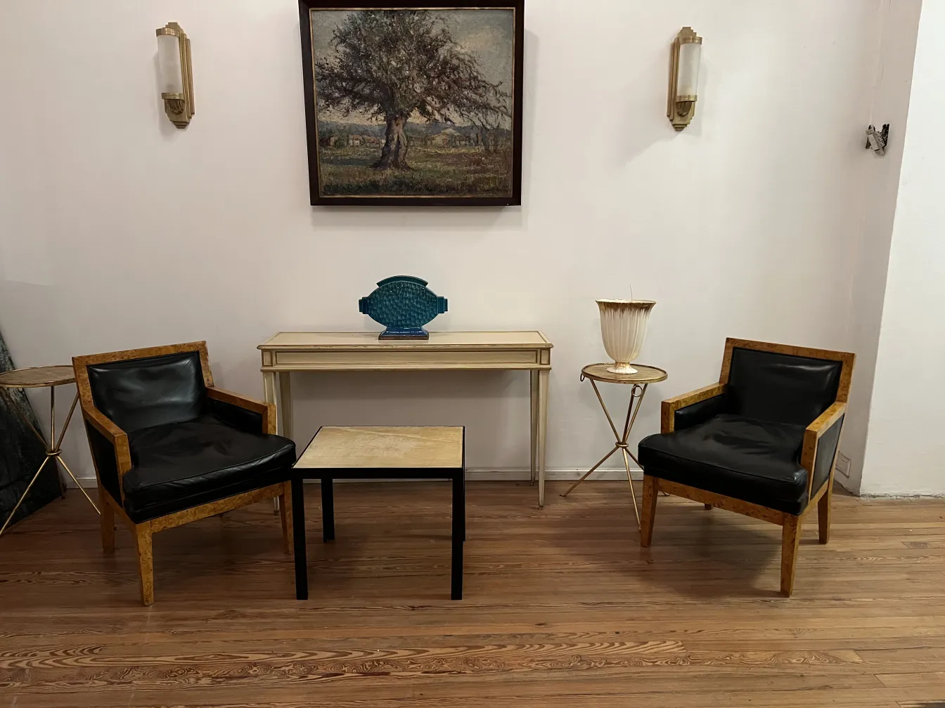 two antique armchairs with elegant design and a cozy atmosphere