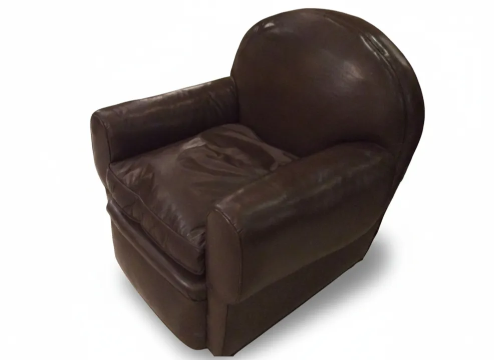 two antique armchairs with a classic design, in an elegant setting.