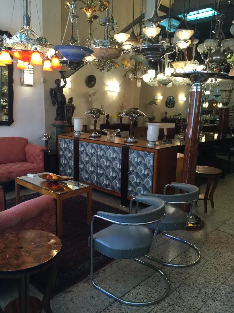 Two antique armchairs to be restored in a cozy setting.