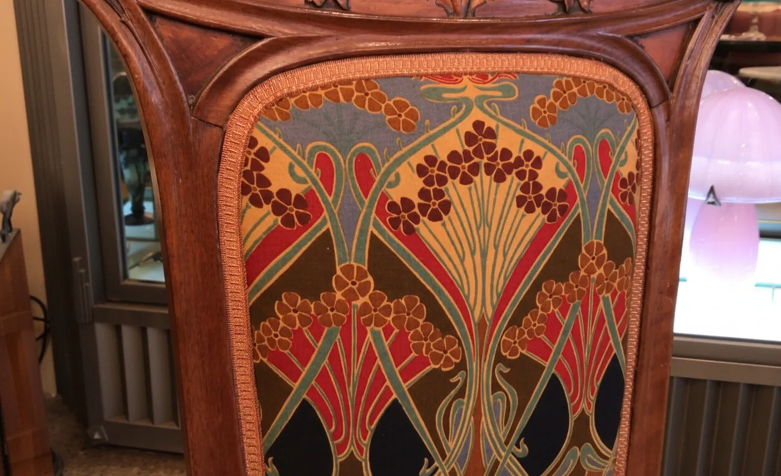 Decorative antique chair in Art Nouveau style with floral patterns