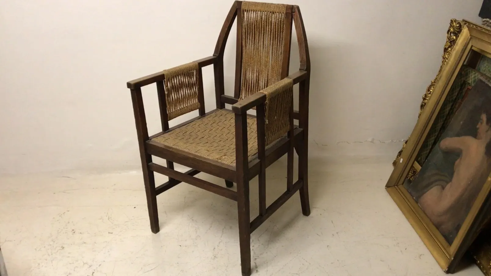 Antique desk chair in a minimal setting