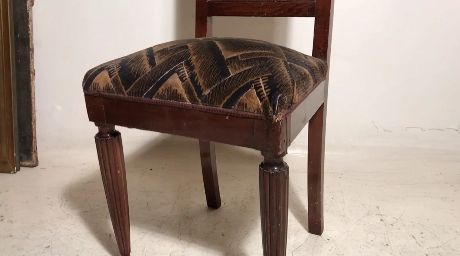 antique chairs with cushion design, restoration setting