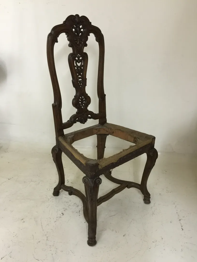 two antique chairs on a light background, to restore