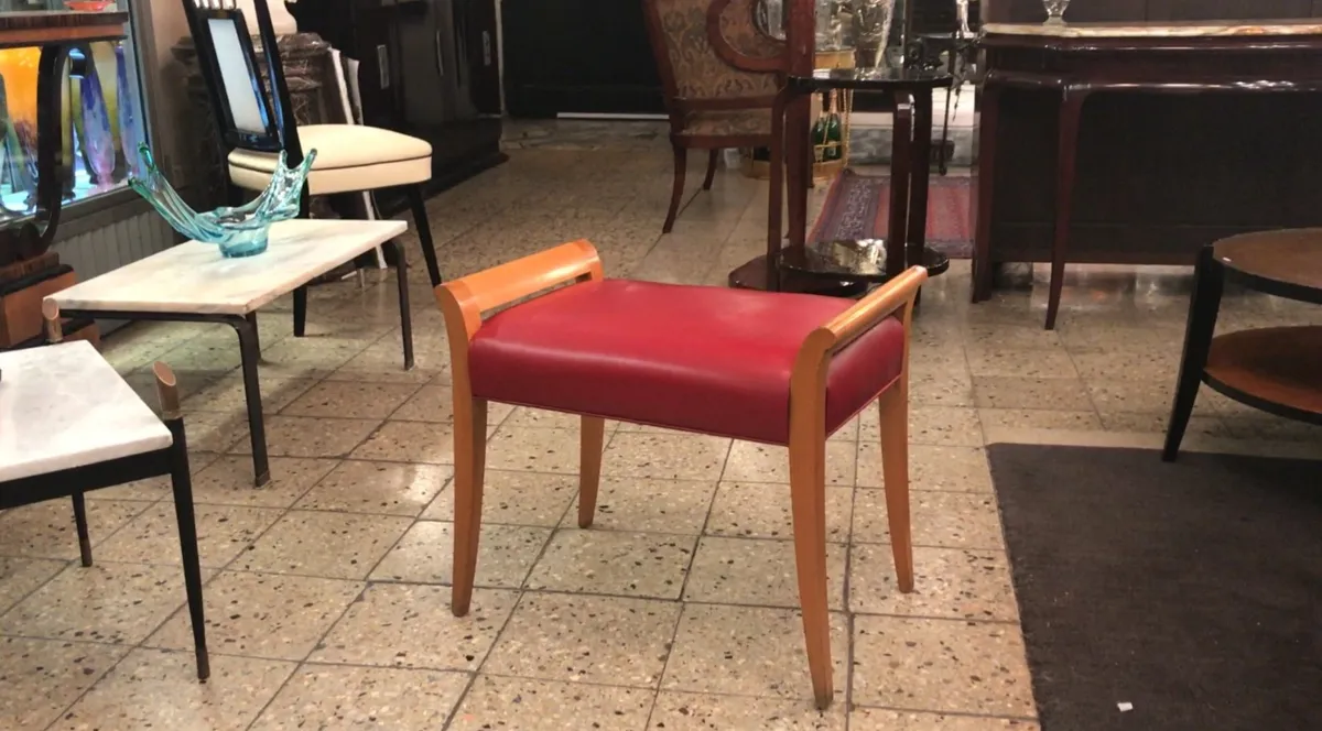 antique red stool with a simple design