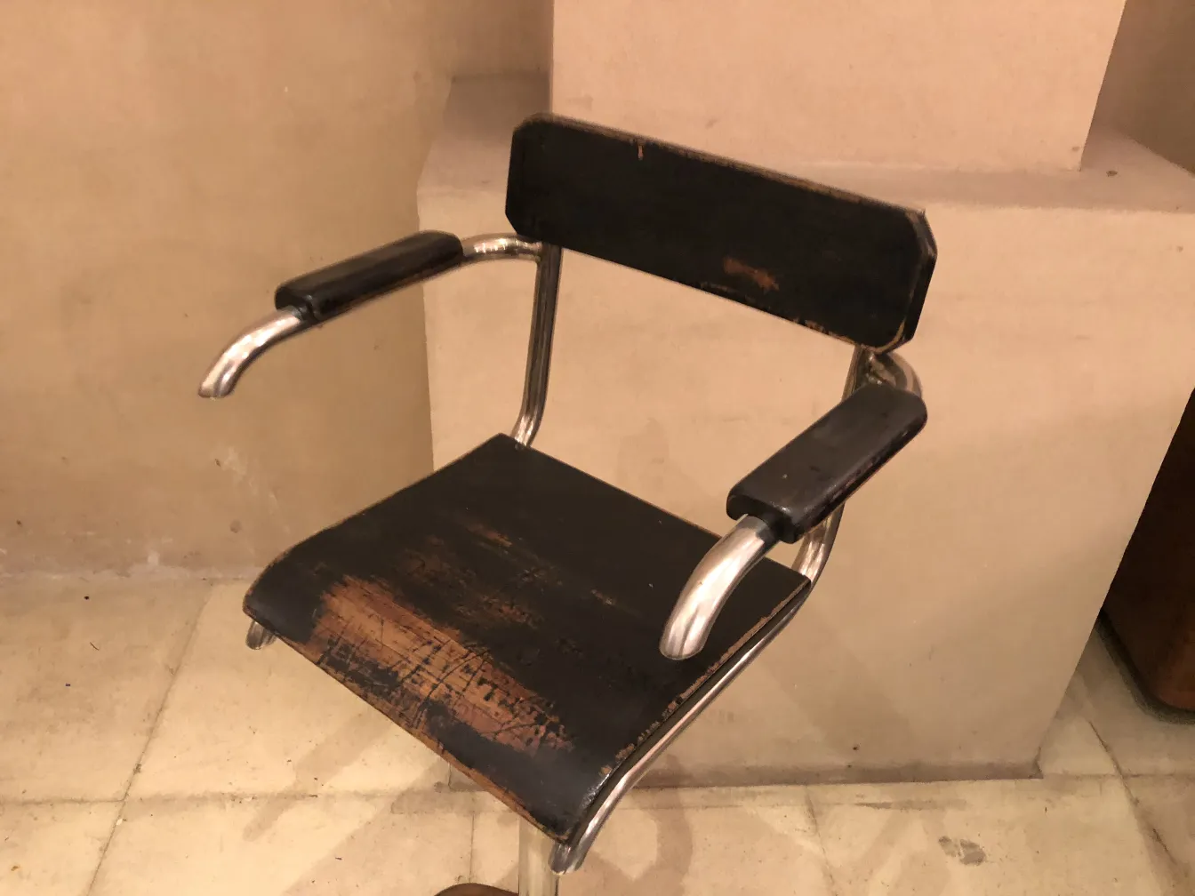 antique Brehuer chair with surrounding details