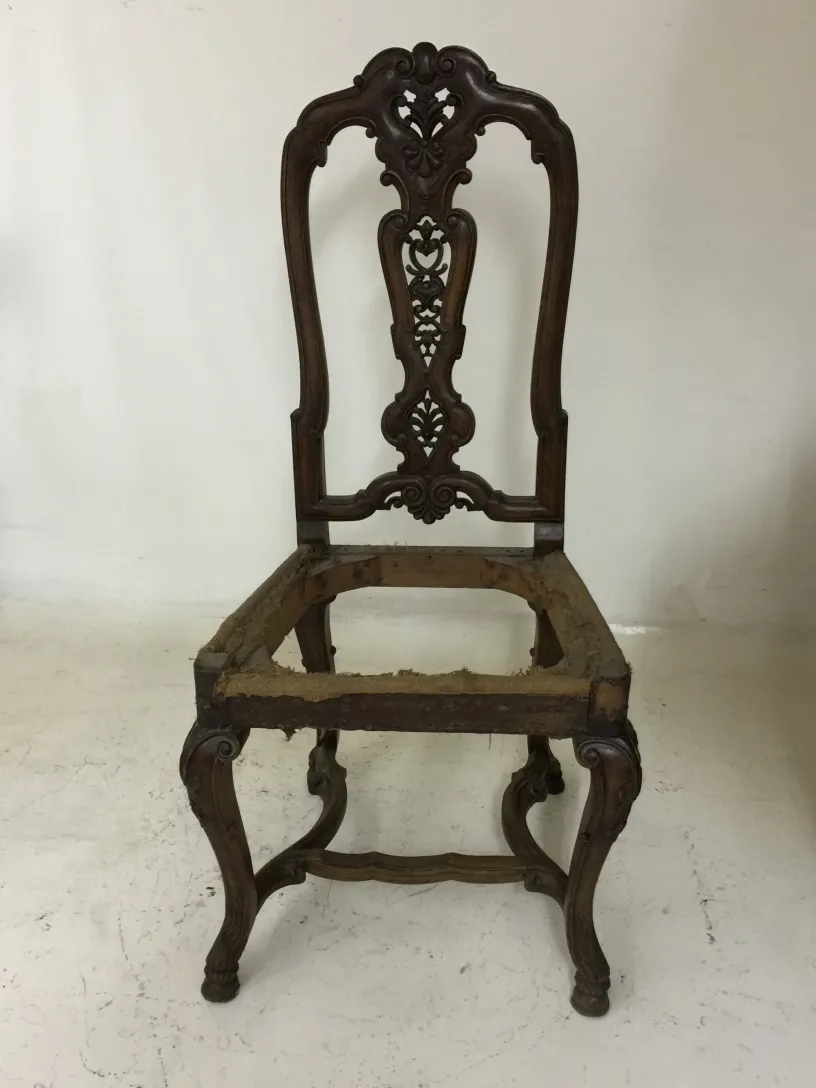 two antique chairs, detailed design, needs restoration