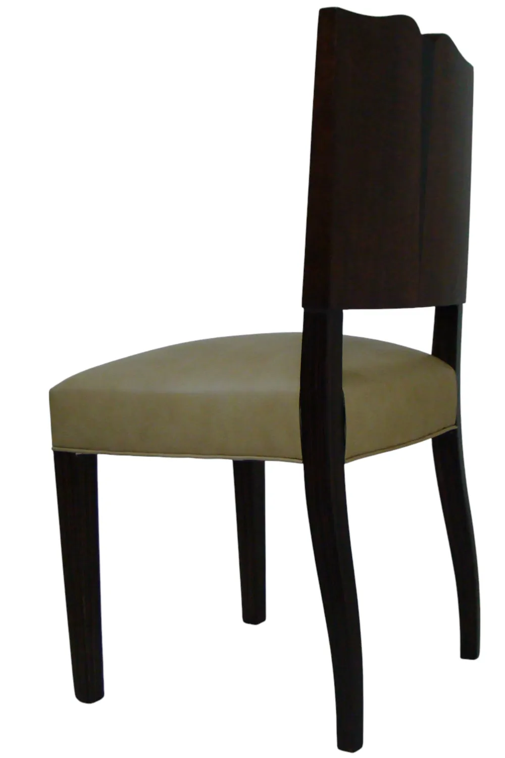 four antique chairs with straight backs in neutral setting