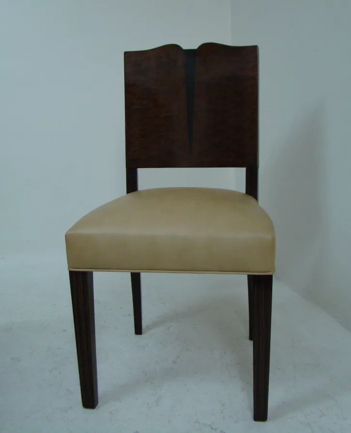 antique chairs with distinctive backrest and cushioned seat