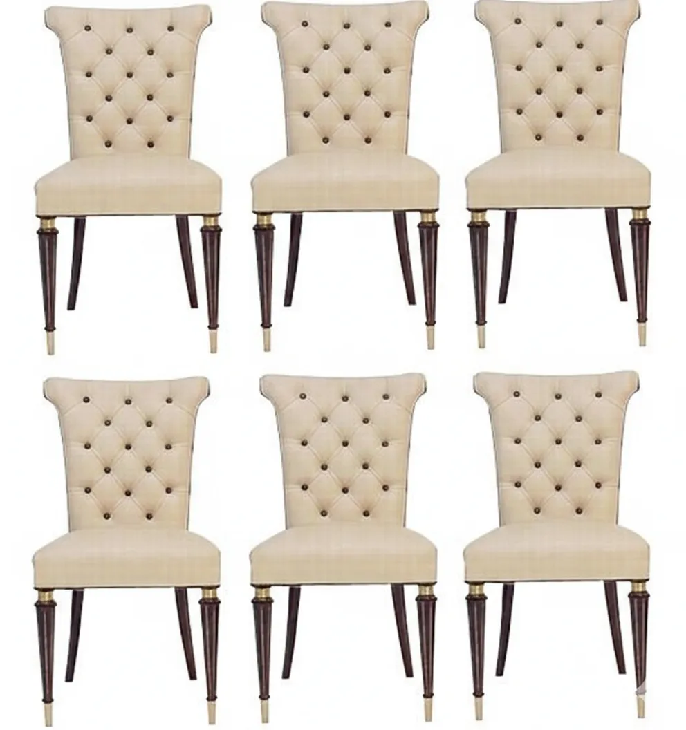 Set of 6 vintage chairs in an elegant setting.