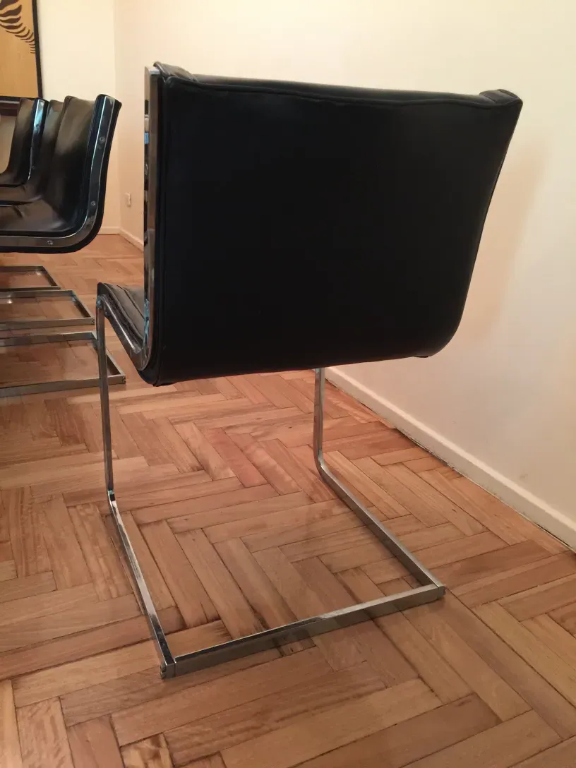 Side view of antique chairs in a relaxed setting.