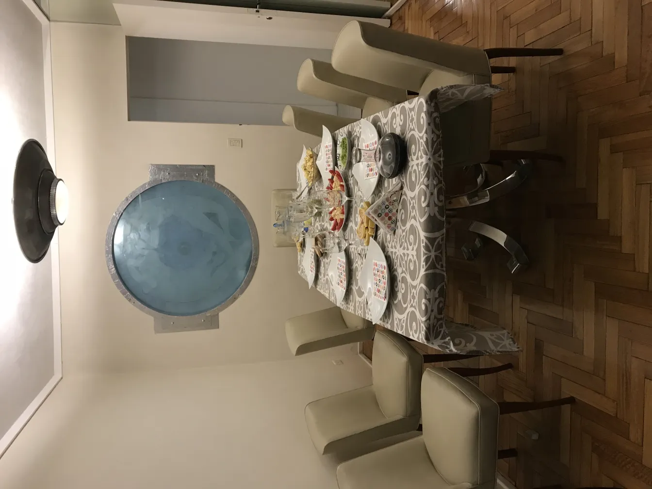 10 antique chairs in an elegant dining room setting