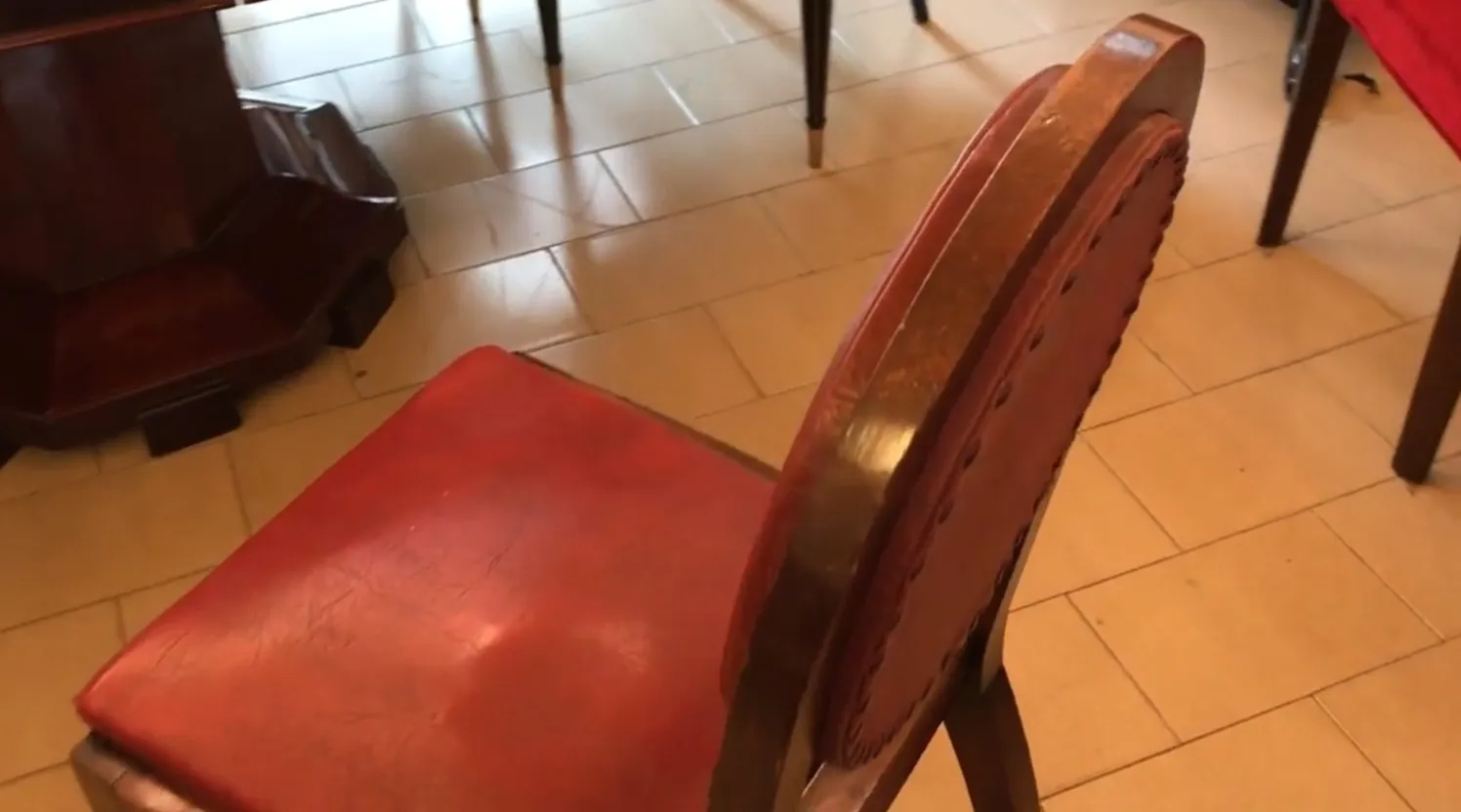 antique chairs with leather finish, home setting
