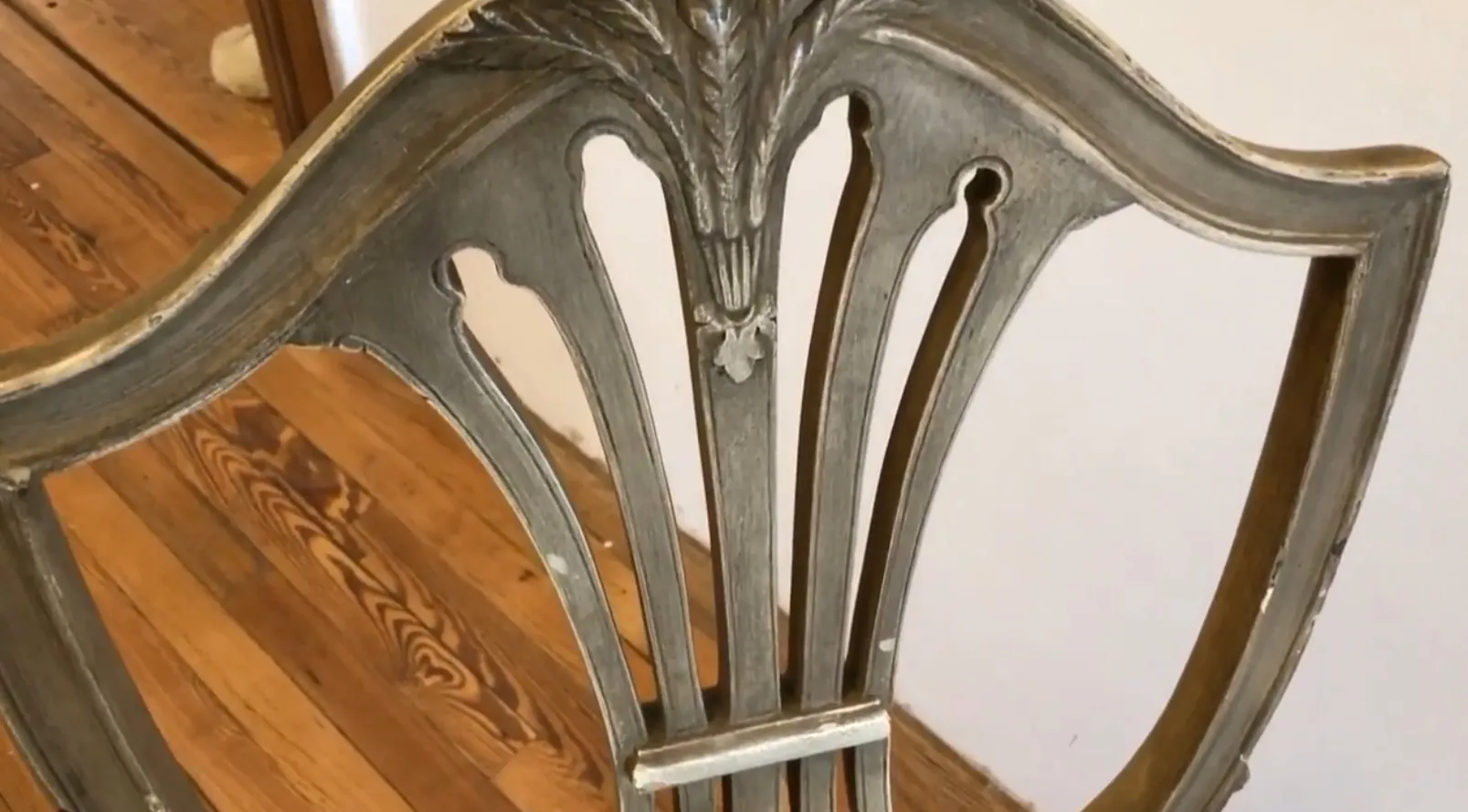 Detailed view of 10 antique chairs in a cozy setting, perfect for restoration.