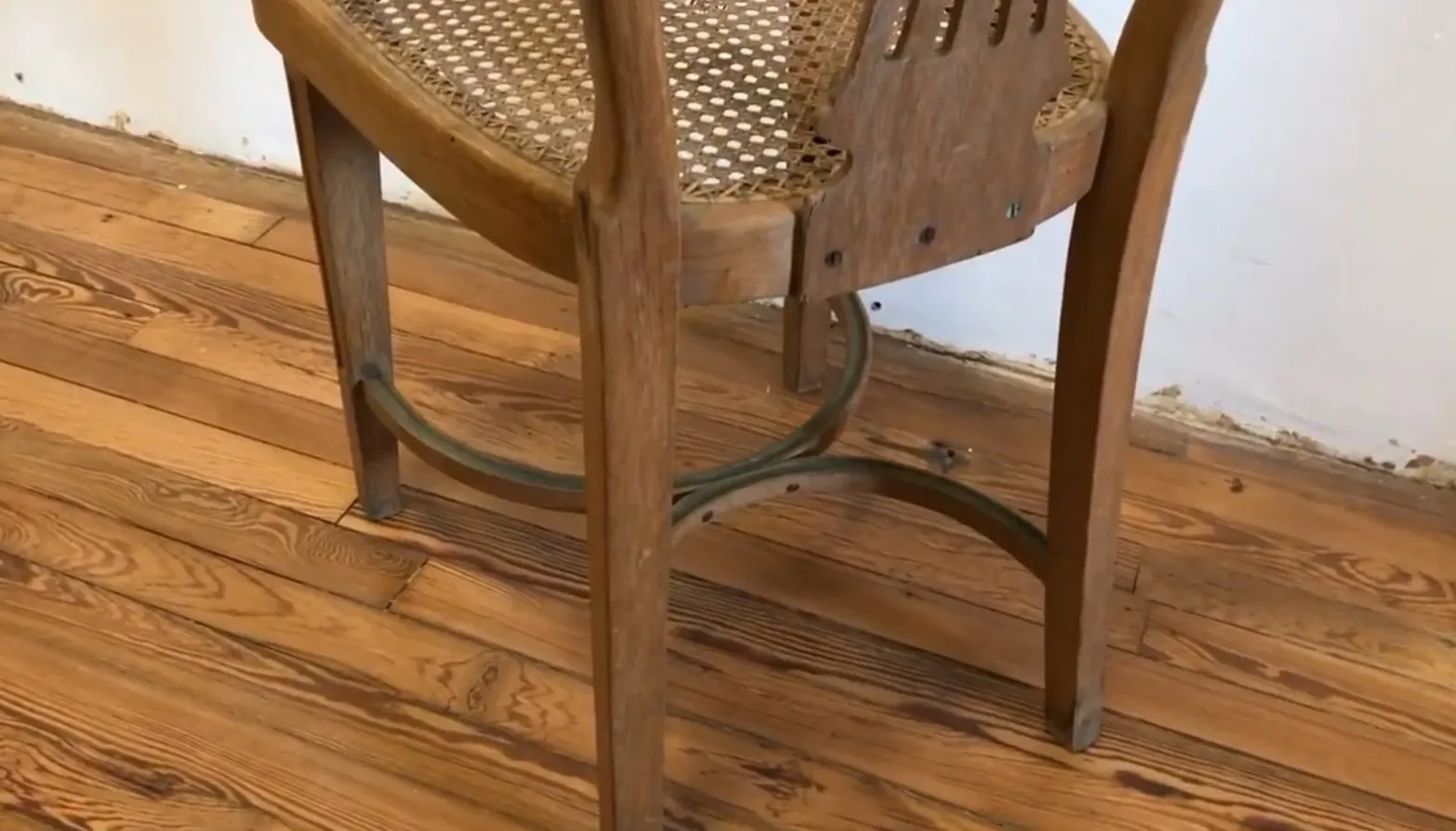 Twelve antique Thonet chairs in a restorative setting.