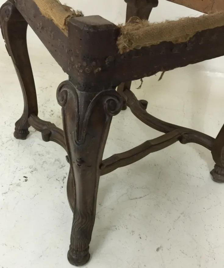 Antique chairs with worn structure in a bright setting