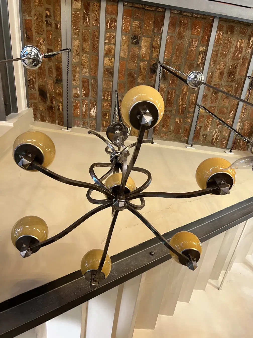 antique hanging lamp in art deco style with yellow lights