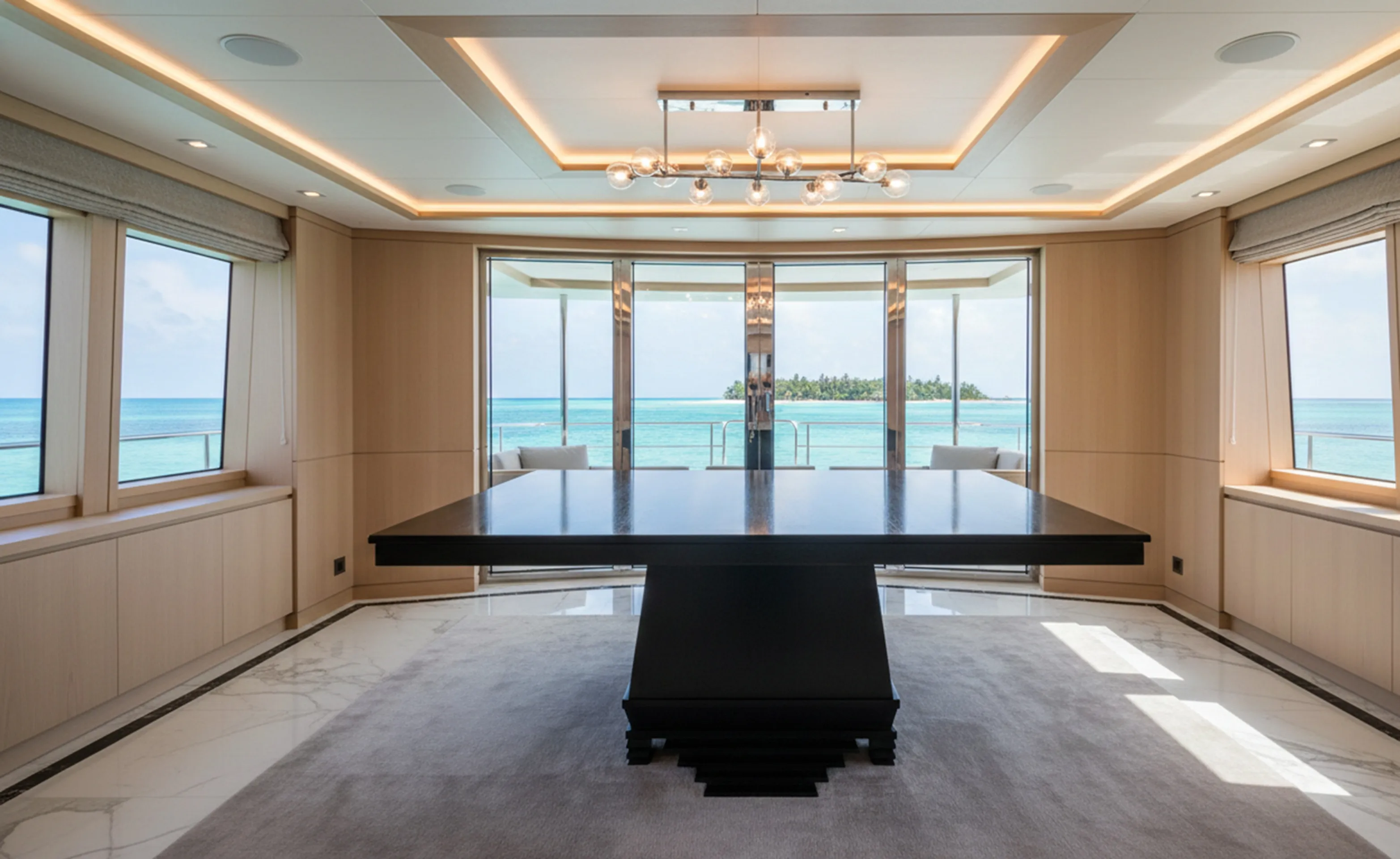 Antique dining table for eight people with sea view.