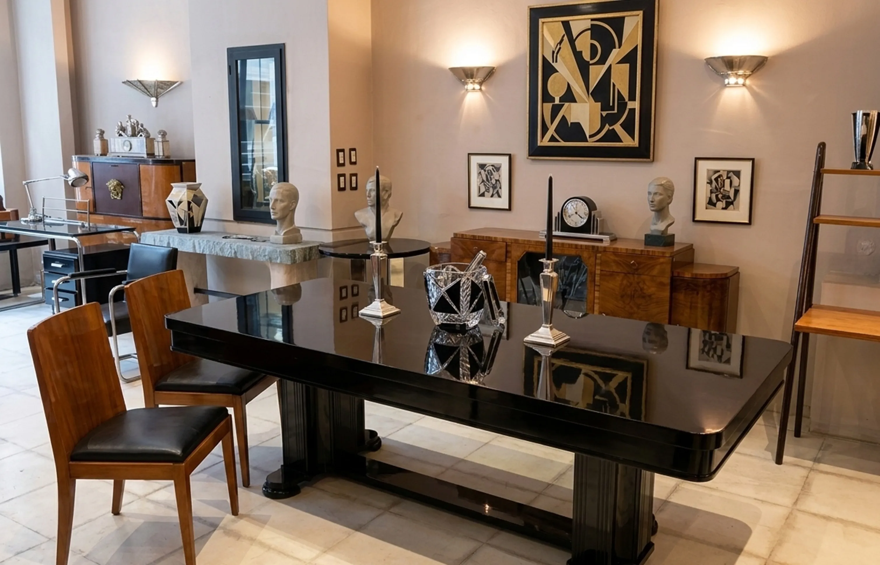 antique black console table with candles and sculptures