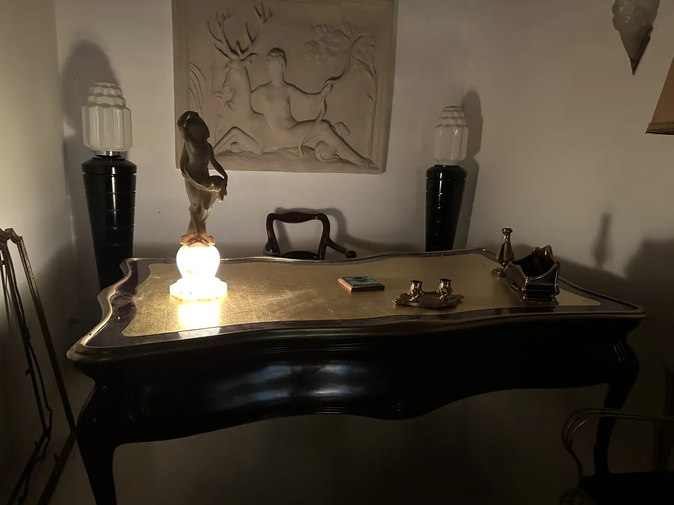 illuminated ancient sculpture on a decorative table