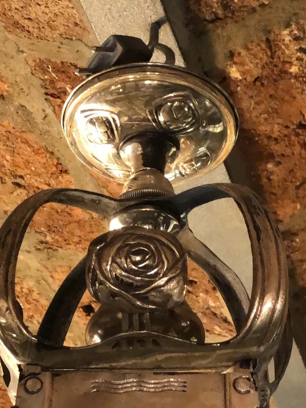 antique hanging lamp with rose design, cozy ambiance