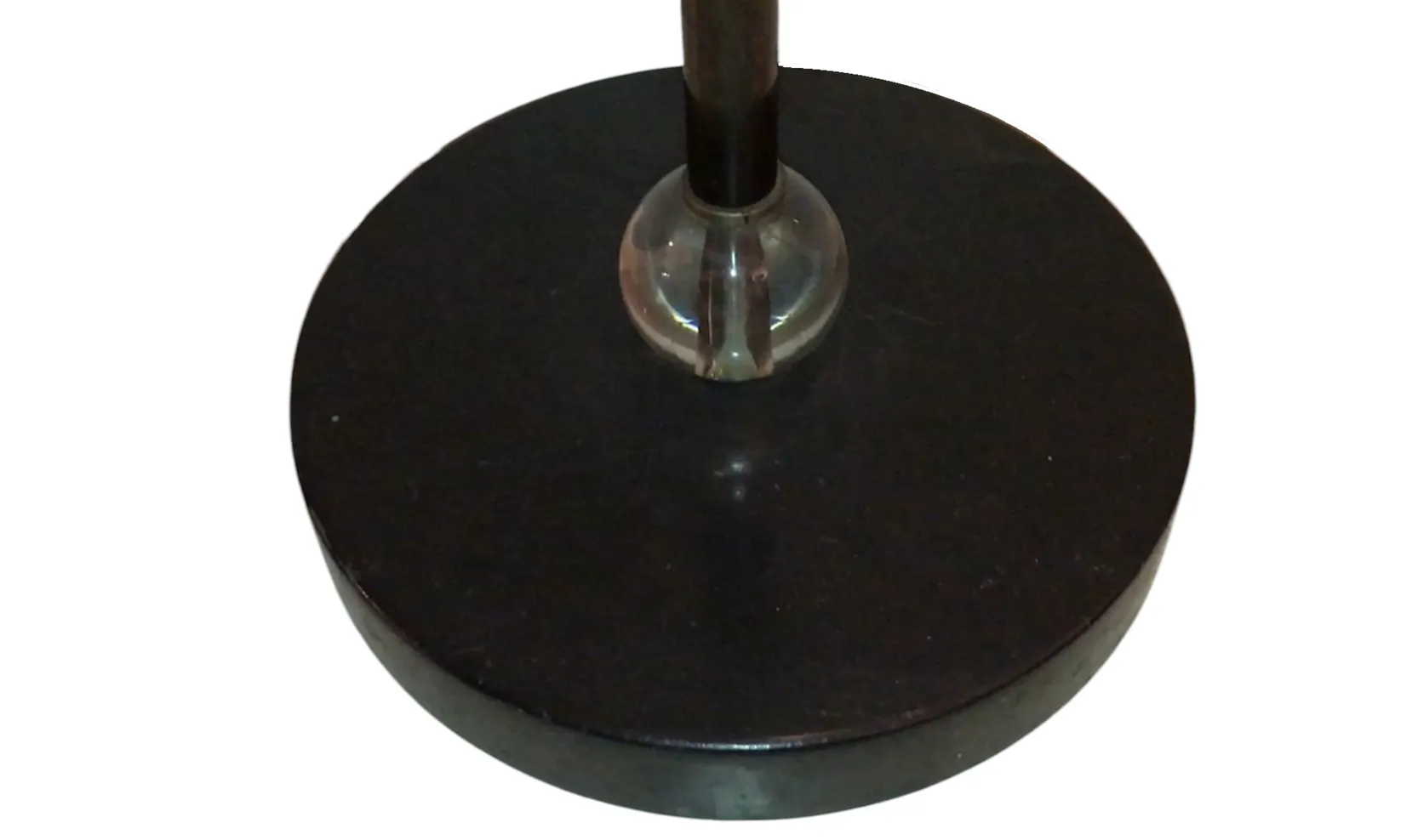 Round base of an antique floor lamp with art deco design