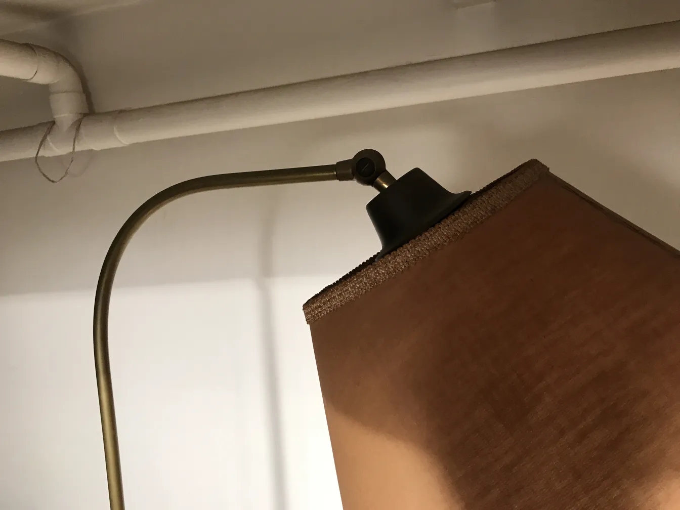 Antique floor lamp in Art Deco style in a cozy setting.