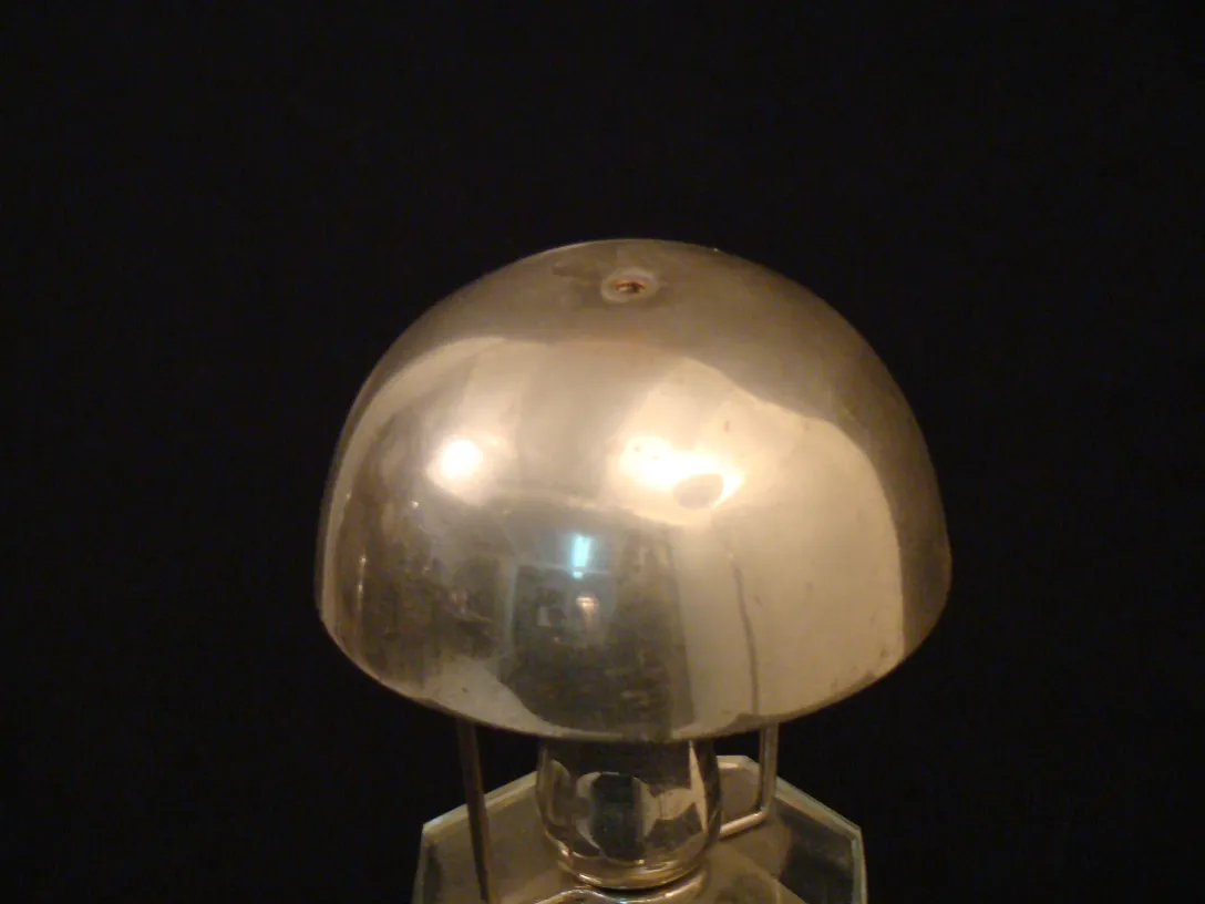 antique table lamp in Art Deco style with shiny shade