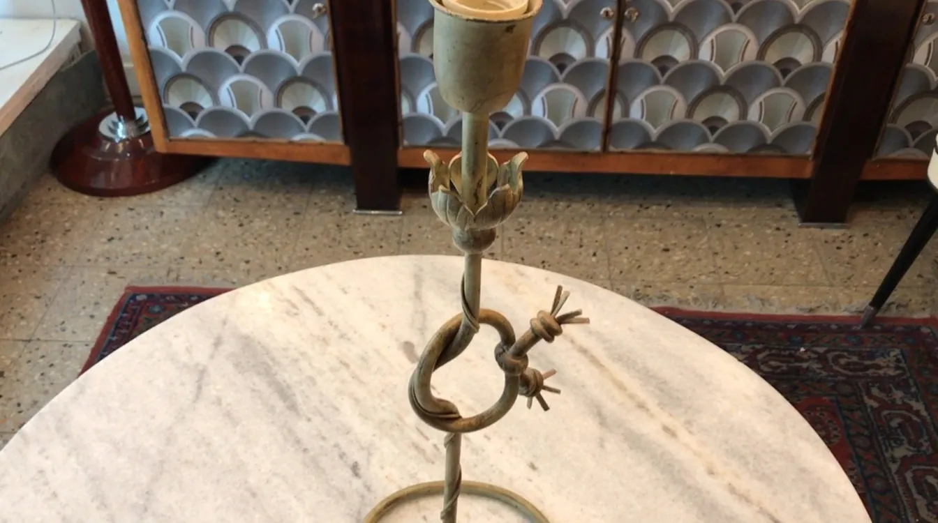 Antique table lamp with artistic Art Deco design.